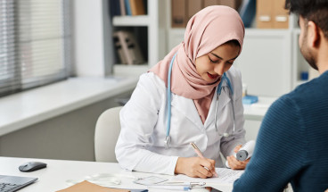 Doctor writes notes