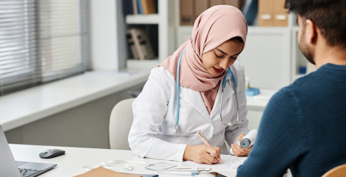 Doctor writes notes