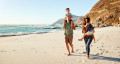 family on beach 767x418