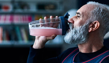man drinking smoothie